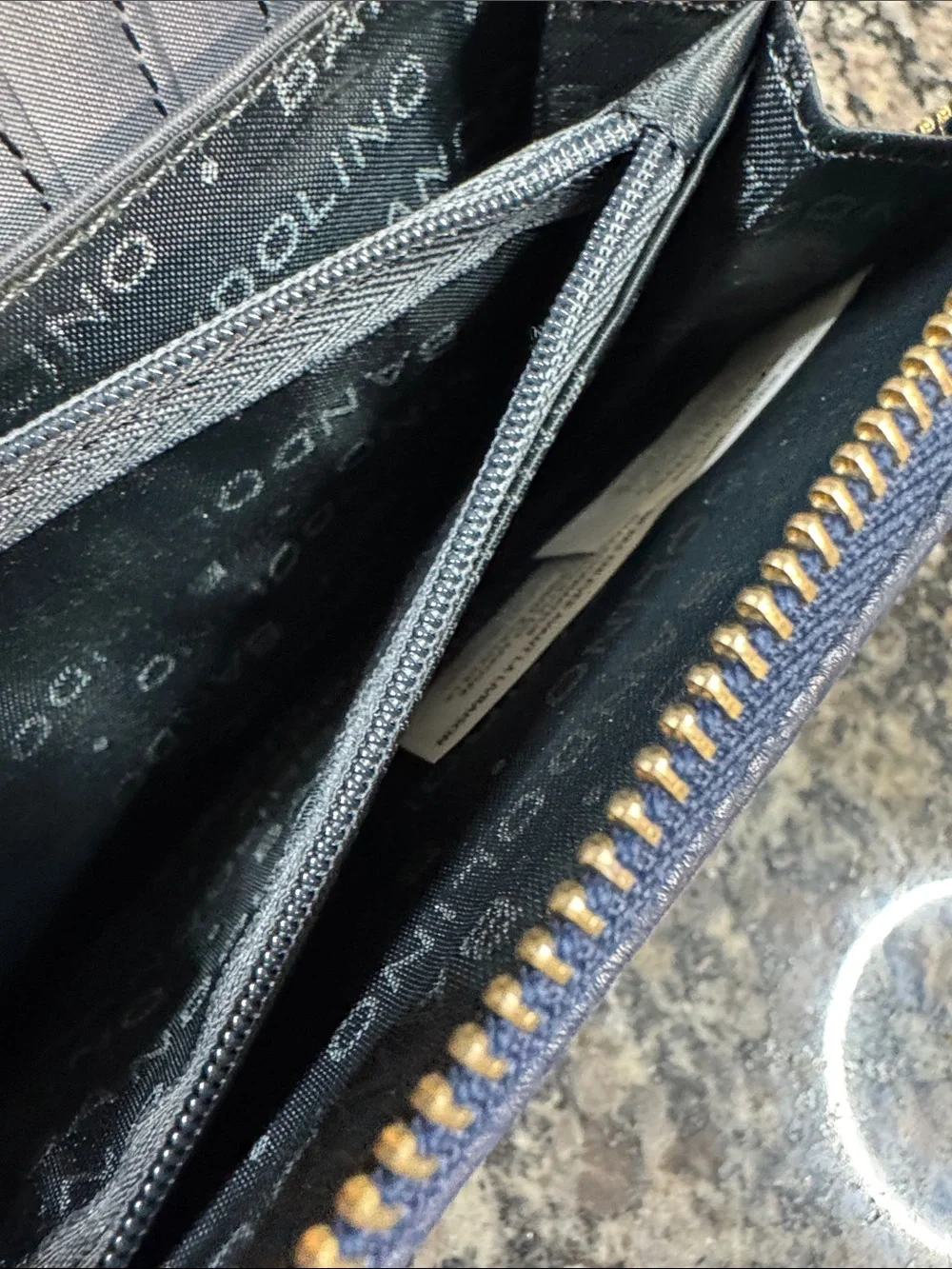 Bandolino Navy Pebbled Zip Wristlet with Gold Plaque